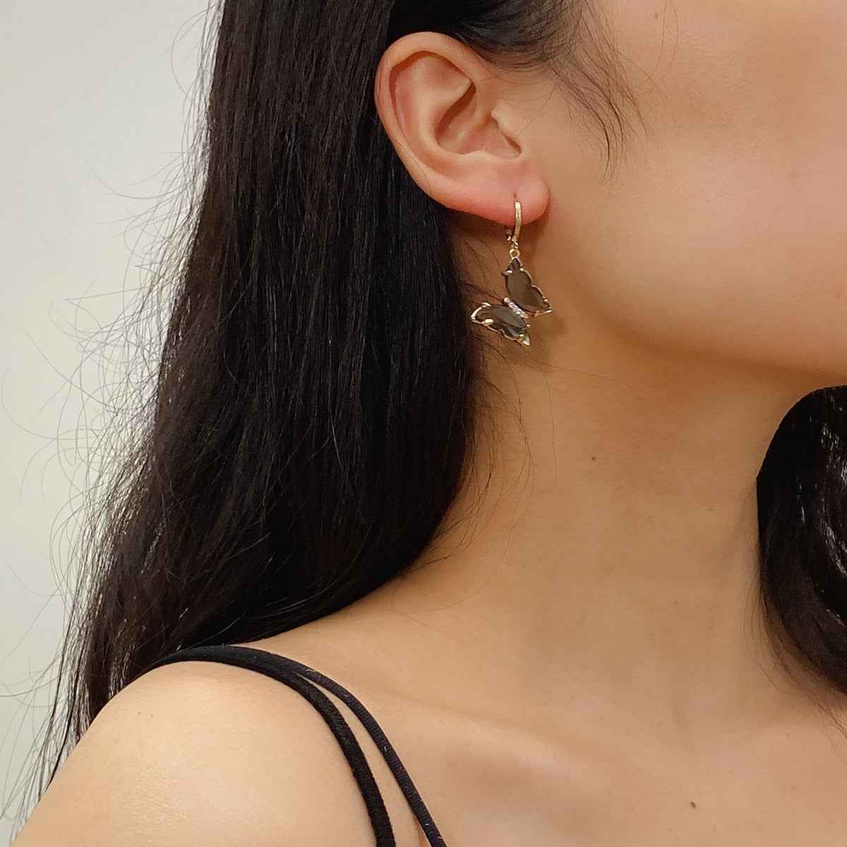 Tracy Black Hanging Gold Butterfly Earrings